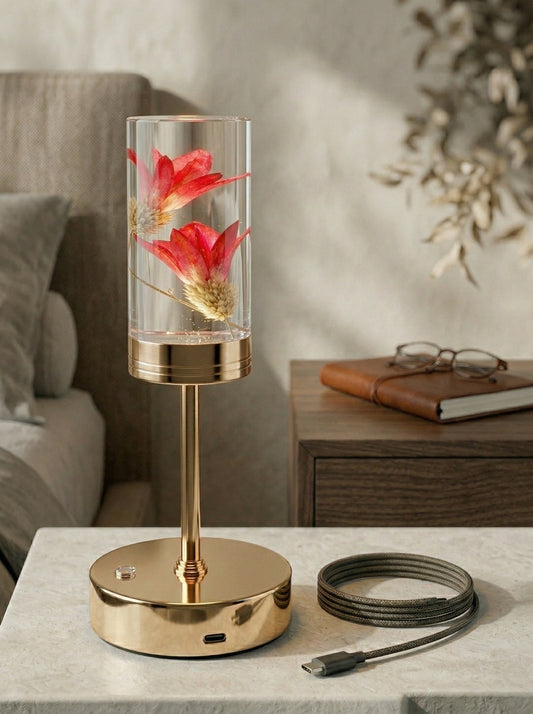 Gold and Red Phoenix Lamp: clear resin cylinder with red dried flowers on a gold stem, beside its cable